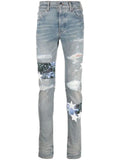 AMIRI - Star-Patch Skinny Jeans